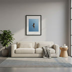Framed detailed caracara, bird of prey, flying against a clear blue sky in Colombia.