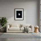 Framed, detailed full moon print against a black sky.